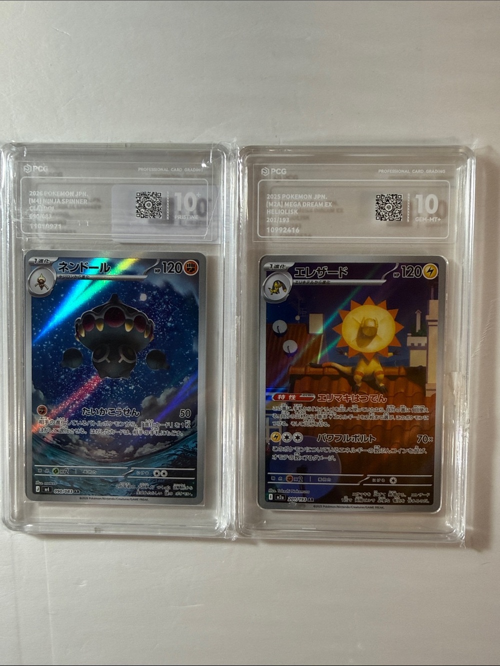 Pokemon Graded Holo Card Pair - Blue & Gold Accents graded